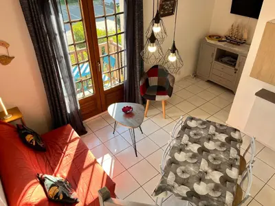 Télévision ou salle de divertissement dans l'établissement APPT 4P - Manoirs 1 à la Mer Chez Claudette & Marc