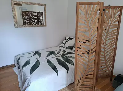Un ou plusieurs lits dans un hébergement de l'établissement Studio chic, hyper centre, 4 minutes de la plage