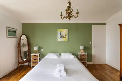 Un ou plusieurs lits dans un hébergement de l'établissement Le Tangon - Maison de 150m2 face à la mer