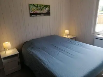 Un ou plusieurs lits dans un hébergement de l'établissement Cottage les petites voiles plage