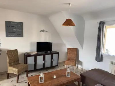 Télévision ou salle de divertissement dans l'établissement Gîtes des Isles - Le Jersey