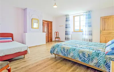 Un ou plusieurs lits dans un hébergement de l'établissement Lovely Home In Fierville-Les-Mines