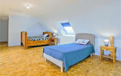 Un ou plusieurs lits dans un hébergement de l'établissement Lovely Home In Fierville-Les-Mines