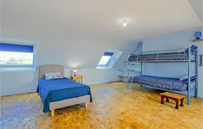 Un ou plusieurs lits dans un hébergement de l'établissement Lovely Home In Fierville-Les-Mines