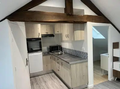 Cuisine ou kitchenette dans l'établissement 2 Appartement neuf centre ville proche gare et commerces