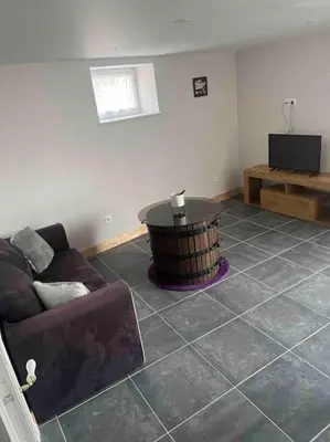 Télévision ou salle de divertissement dans l'établissement Maison chaleureuse parking privé proche de la mer