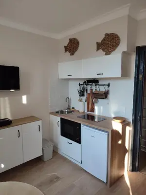 Cuisine ou kitchenette dans l'établissement un nid d ' Amour