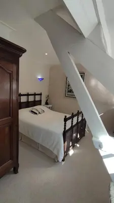 Un ou plusieurs lits dans un hébergement de l'établissement Gites du Domaine du Petit Moulin, à 15 min de la mer, D-Day, nature et calme, idéal famille