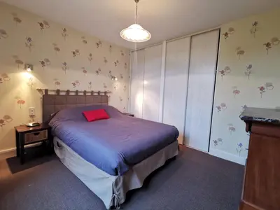 Un ou plusieurs lits dans un hébergement de l'établissement Holiday Home La maison bleue by Interhome