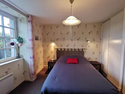 Un ou plusieurs lits dans un hébergement de l'établissement Holiday Home La maison bleue by Interhome