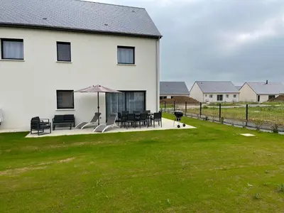 Jardin de l'établissement La Mer Veille, maison neuve avec jardin