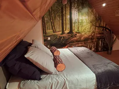Un ou plusieurs lits dans un hébergement de l'établissement La Chaumière avec piscine privée, à 5 minutes du Mont St-Michel