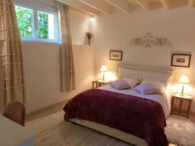 Un ou plusieurs lits dans un hébergement de l'établissement La saunière - Chez Hélène - Gîtes en baie