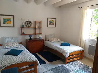 Un ou plusieurs lits dans un hébergement de l'établissement La saunière - Chez Hélène - Gîtes en baie