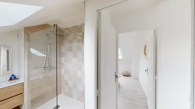 Salle de bains dans l'établissement Appartement Les Sables d’Or