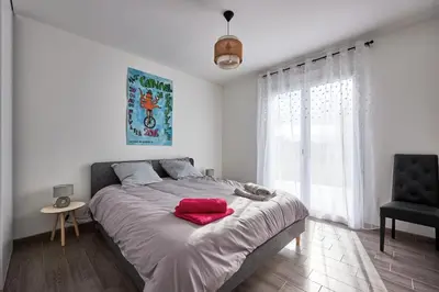 Un ou plusieurs lits dans un hébergement de l'établissement Maison Ariel - Charmante maison pour 6