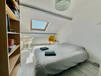 Un ou plusieurs lits dans un hébergement de l'établissement Capucine, duplex à 5 min plage