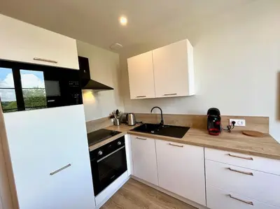 Cuisine ou kitchenette dans l'établissement Isis - SILS
