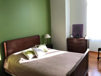 Un ou plusieurs lits dans un hébergement de l'établissement Le Logis du Gast chambre verte