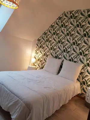 Un ou plusieurs lits dans un hébergement de l'établissement Magnifique villa avec piscine intérieure