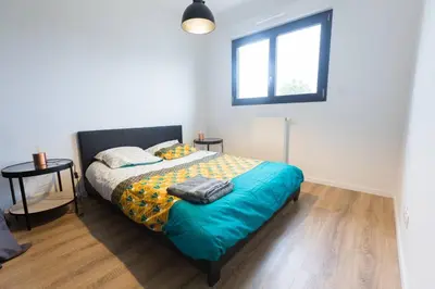 Un ou plusieurs lits dans un hébergement de l'établissement Villa en bord de mer SPA / Sauna (N)