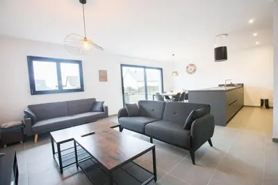 Coin salon dans l'établissement Villa en bord de mer SPA / Sauna (N)