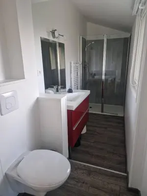 Salle de bains dans l'établissement L'OASIS
