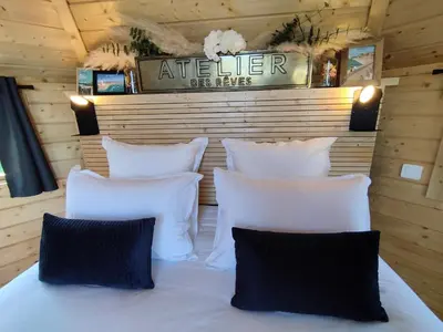 Coin salon dans l'établissement Cottage climatisé avec baignoire SPA 2 personnes
