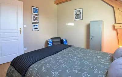 Un ou plusieurs lits dans un hébergement de l'établissement Cozy Home In Saint-Brice-De-Landell
