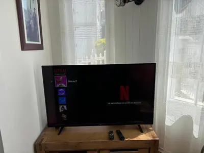Télévision ou salle de divertissement dans l'établissement Villa Alcyon