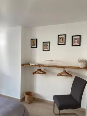 Coin salon dans l'établissement Appartement Les Corsaires