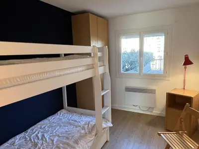 Un ou plusieurs lits dans un hébergement de l'établissement Appartement 3 pièces avec terrasses et vue mer - Parking inclus - FR-1-487-349