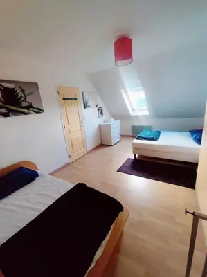 Un ou plusieurs lits dans un hébergement de l'établissement Maison a 400 m de la mer