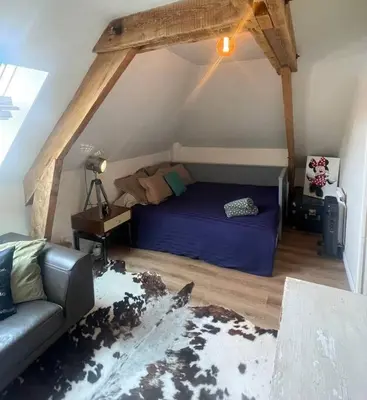 Un ou plusieurs lits dans un hébergement de l'établissement Appartement Cosy et charmant