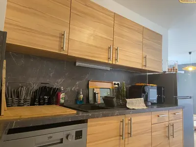Cuisine ou kitchenette dans l'établissement L'appart' du bord de mer 150m de la plage