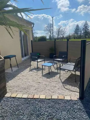 Terrasse ou espace extérieur de l'établissement Escapade Normande avec son sauna privé