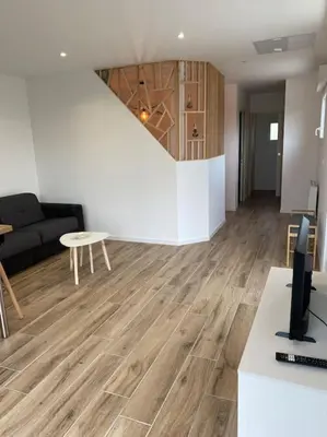 Télévision ou salle de divertissement dans l'établissement Escapade Normande avec son sauna privé