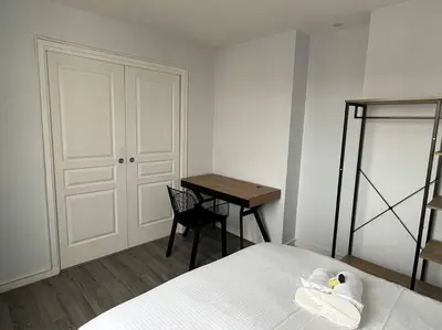 Un ou plusieurs lits dans un hébergement de l'établissement Wasat, Joli appt 3 chambres à Caen