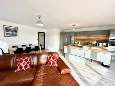 Cuisine ou kitchenette dans l'établissement T4 avec grande terrasse et parking privé
