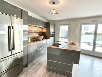 Cuisine ou kitchenette dans l'établissement T4 avec grande terrasse et parking privé