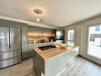 Cuisine ou kitchenette dans l'établissement T4 avec grande terrasse et parking privé