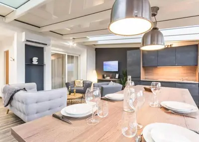 Coin salon dans l'établissement Deux logements voisins au calme Olivia et Victoria