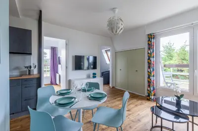 Télévision ou salle de divertissement dans l'établissement Eole - Vue mer, à 200 m de la plage