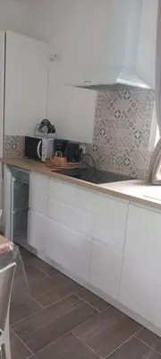 Cuisine ou kitchenette dans l'établissement Le Gîte insolite Gonnedouillé