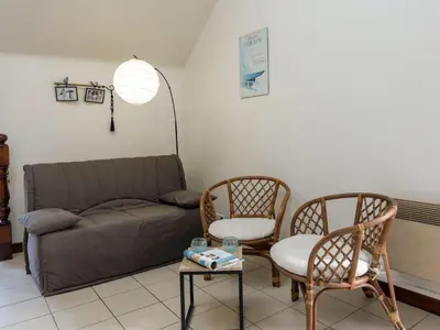 Coin salon dans l'établissement Holiday Home Les Grands Près by Interhome