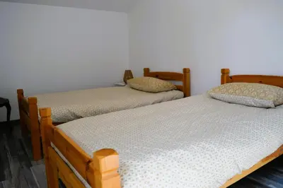 Un ou plusieurs lits dans un hébergement de l'établissement La Guillaumière - Maison avec bel extérieur