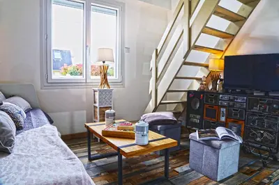 Coin salon dans l'établissement Maison Roudoudou - Charmante maison à moins de 300m de la plage