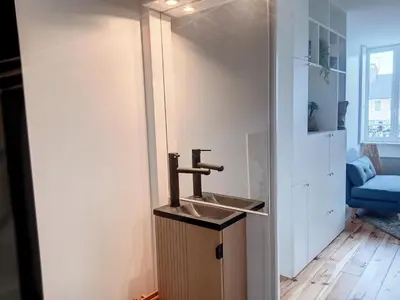 Télévision ou salle de divertissement dans l'établissement Appartement rénové, 1 chambre, 300m de la gare, près du centre de Granville - FR-1-361-479