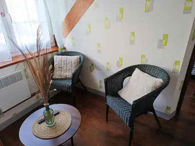 Coin salon dans l'établissement AU DETOUR DU MONT Chambres d'hôtes